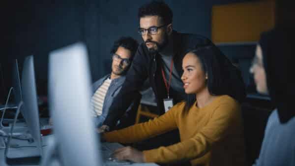 people looking at computer