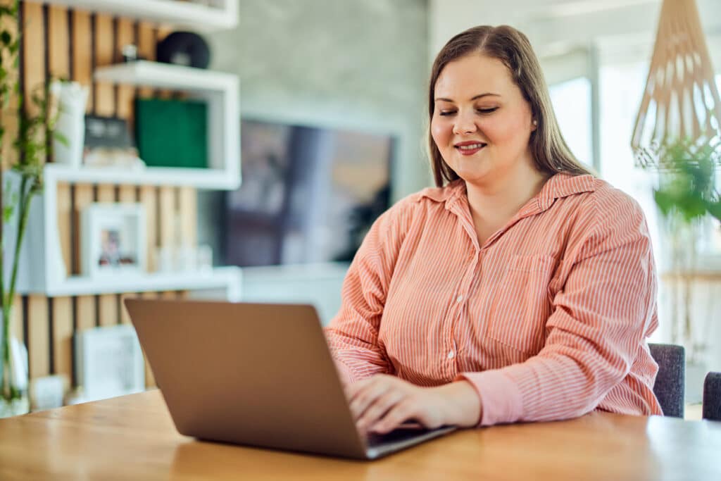 woman selecting association volunteers from a volunteer list