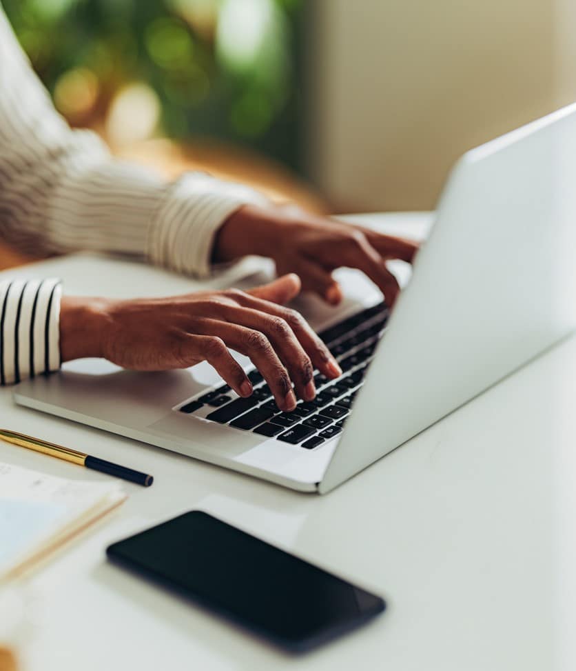 woman typing on computer