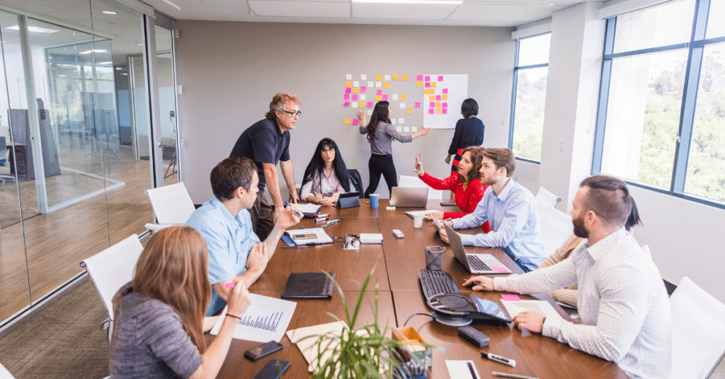 Team discusses customer journey map