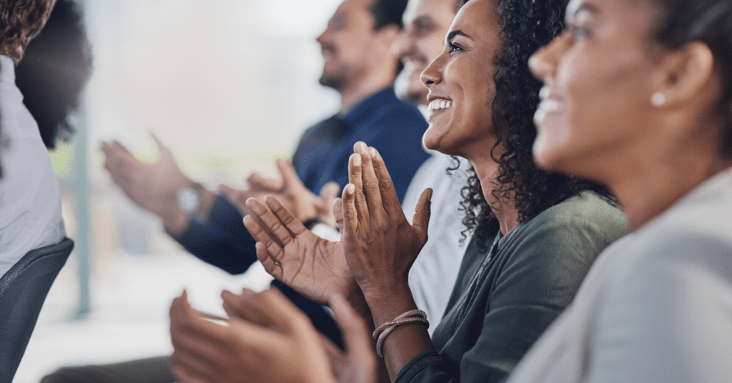 Customers applauding for customer-focused company